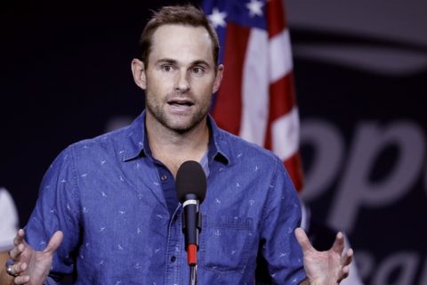Andy Roddick speaks during a ceremony at the U.S. Open tennis tournament, Friday, Sept. 7, 2018, in New York. (AP Photo/Seth Wenig)