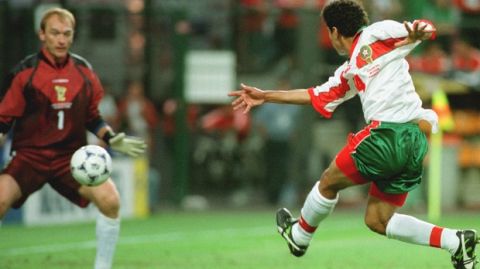 Morocco's Salaheddine Bassir scores first Morocco's goal as Scotland's goalkeeper Jim Leighton can't stop the ball, during the Scotland vs Morocco, Group A, World Cup 98, soccer match at Geoffroy Guichard Stadium in Saint Etienne, Tuesday, June 23, 1998.  (AP Photo/Denis Doyle)