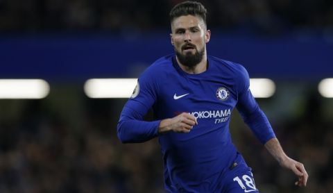 Chelsea's Olivier Giroud waits for throw in to be taken during the English Premier League soccer match between Chelsea and West Bromwich Albion at Stamford Bridge stadium in London, Monday, Feb. 12, 2018. (AP Photo/Alastair Grant)