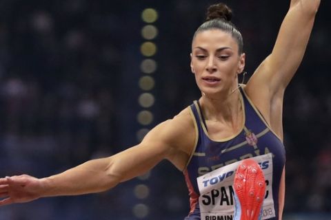 Serbia's Ivana Spanovic makes an attempt in the women's long jump final at the World Athletics Indoor Championships in Birmingham, Britain, Sunday, March 4, 2018. (AP Photo/Matt Dunham)