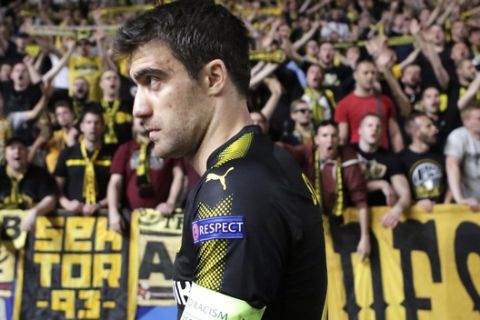 Dortmund's Sokratis leaves the pitch after the Champions League Group H soccer match between APOEL Nicosia and Borussia Dortmund at GSP stadium, in Nicosia, Cyprus, on Tuesday, Oct. 17, 2017. (AP Photo/Petros Karadjias)