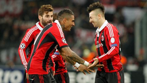 AC Milan's Stephan El Shaarawy (R) celebrates with teammates Kevin-Prince Boateng (C) after scoring a goal  during an UEFA Champions League group C football match between Anderlecht and AC Milan on November 21, 2012 in Brussels. AFP PHOTO / BELGA  / KRISTOF VAN ACCOM.Belgium Out        (Photo credit should read KRISTOF VAN ACCOM/AFP/Getty Images)