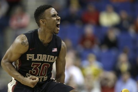 Florida State's Ian Miller (30) reacts during the second half of a second round NCAA college basketball game against Maryland at the Atlantic Coast Conference tournament in Greensboro, N.C., Thursday, March 13, 2014. Florida State won 67-65. (AP Photo/Bob Leverone)