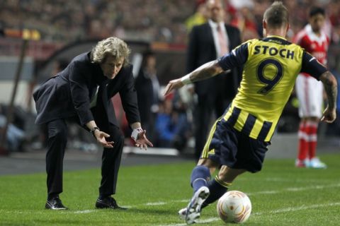 Benfica's coach Jorge Jesus, left, reacts in front of Fenerbahce's Miroslav Stoch, from Slovakia, during the Europa League semi final second leg soccer match between Fenerbahce against Benfica at Benfica's Luz stadium in Lisbon, Thursday, May 2, 2013. Benfica won the match 3-2 on aggregate and will play the final in Amsterdam on May 15. (AP Photo/Francisco Seco)