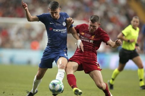 Chelsea's Jorginho, left, duels for the ball with Liverpool's James Milner during the UEFA Super Cup soccer match between Liverpool and Chelsea, in Besiktas Park, in Istanbul, Wednesday, Aug. 14, 2019. (AP Photo)