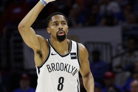 Brooklyn Nets' Spencer Dinwiddie reacts to his three-point basket during the first half in Game 1 of a first-round NBA basketball playoff series against the Philadelphia 76ers, Saturday, April 13, 2019, in Philadelphia. (AP Photo/Chris Szagola)
