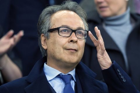 FILE - In this Saturday, March 12, 2018 file photo, Everton's new majority shareholder Farhad Moshiri stands, prior to the start of the English FA Cup quarter-final soccer match between Everton and Chelsea at Goodison Park Stadium, Liverpool, England. Iranian-British businessman Moshiri has increased his stake in Everton to 68.6 percent in another sign of his long-term commitment to a team seeking to regain its place in the Premier Leagues elite, it was reported on Tuesday, Sept 11, 2018. (AP Photo/Jon Super, File)