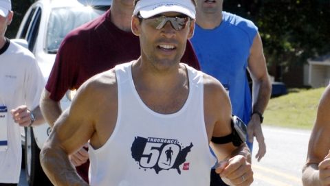 Ultra-Marathon runner Dean Karnazes runs the Little Rock, Ark., marathon course, Wednesday, Sept. 20, 2006, to raise money for youth programs. Karnazes, who in October 2005 ran 350 continuous miles in a charity run, plans to run 50 marathons in 50 days, one in each state. Little Rock is the fourth 26.2-mile run in his effort. (AP Photo/Mike Wintroath)