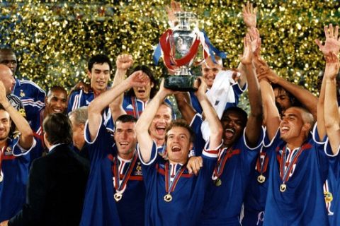 France soccer team players celebrate after winning the final game of the European soccer Championships, on July 2, 2000 in Rotterdam, the Netherlands. France defeated Italy 2-1 in extra time to win the Championship. (Ap Photo/Carlo Fumagalli)