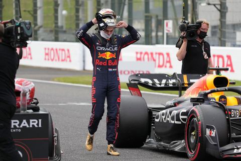 Red Bull driver Max Verstappen of the Netherlands removes his helmet after the qualifying session of the Japanese Formula One Grand Prix at the Suzuka Circuit in Suzuka, central Japan, Saturday, Oct. 8, 2022. (AP Photo/Toru Hanai)