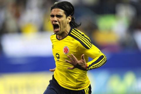 Colombia¿s soccer player Falcao Garcia celebrates second scoring during the friendly match between Colombia and Ecuador at the Estadio Vicente Calderon in Madrid, on March 26, 2011.  AFP PHOTO/ PEDRO ARMESTRE

 FBL-FRIENDLY-COLOMBIA-ECUADOR