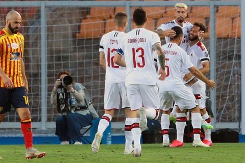 AC Milan's Samu Castillejo, top right, celebrates with teammates after scoring during the Serie A soccer match between Lecce and AC Milan, at the Via del Mare stadium in Lecce, Italy, Monday, June 22, 2020. (Donato Fasano/LaPresse via AP)