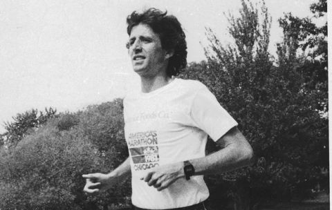 Olympic runner Frank Shorter limbers up along the route of the Chicago Marathon, a 26-mile-plus run through the citys neighborhood areas and along Lake Michigan in Chicago on Sept. 15, 1981, to be held on September 27. (AP Photo/Charles Kenneth)
