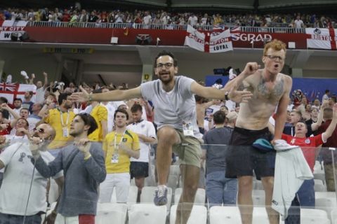 England's fans celebrate at the end of the group G match between Tunisia and England at the 2018 soccer World Cup in the Volgograd Arena in Volgograd, Russia, Monday, June 18, 2018. (AP Photo/Thanassis Stavrakis)