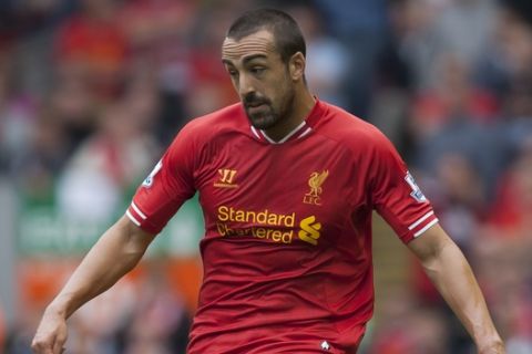 Liverpool's Jose Enrique during his team's English Premier League soccer match against Manchester United at Anfield Stadium, Liverpool, England, Sunday Sept. 1, 2013. (AP Photo/Jon Super)    

