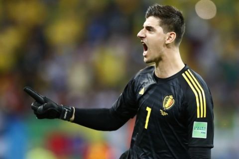 Belgium goalkeeper Thibaut Courtois celebrates after Belgium's Kevin De Bruyne score belgium's 2nd goal of the game during the quarterfinal match between Brazil and Belgium at the 2018 soccer World Cup in the Kazan Arena, in Kazan, Russia, Friday, July 6, 2018. (AP Photo/Matthias Schrader)
