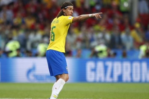 Brazil's Filipe Luis gives instructions during the group E match between Serbia and Brazil, at the 2018 soccer World Cup in the Spartak Stadium in Moscow, Russia, Wednesday, June 27, 2018. (AP Photo/Matthias Schrader)