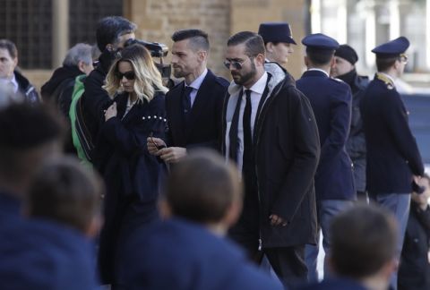 Napoli midfielder Marek Hamsik arrives for the funeral ceremony of Italian player Davide Astori in Florence, Italy, Thursday, March 8, 2018. The 31-year-old Astori was found dead in his hotel room on Sunday after a suspected cardiac arrest before his team was set to play an Italian league match at Udinese. (AP Photo/Alessandra Tarantino)