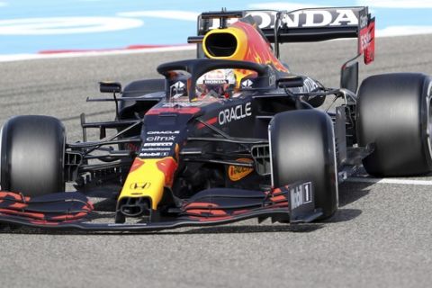 Red Bull driver Max Verstappen of the Netherlands steers his car during the third free practice at the Formula One Bahrain International Circuit in Sakhir, Bahrain, Saturday, March 27, 2021. The Bahrain Formula One Grand Prix will take place on Sunday. (AP Photo/Kamran Jebreili)