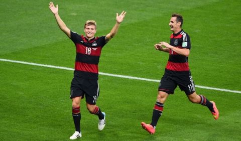 BELO HORIZONTE, BRAZIL - JULY 08:  Toni Kroos of Germany (L) celebrates scoring his team's third goal with Miroslav Klose during the 2014 FIFA World Cup Brazil Semi Final match between Brazil and Germany at Estadio Mineirao on July 8, 2014 in Belo Horizonte, Brazil.  (Photo by Jamie McDonald/Getty Images)