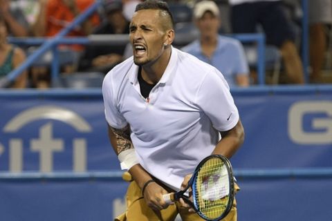 Nick Kyrgios, of Australia, reacts during a match in the Citi Open tennis tournament against Norbert Gombos, of Slovakia, Friday, Aug. 2, 2019, in Washington. Kyrgios won 6-3, 6-3. (AP Photo/Nick Wass)