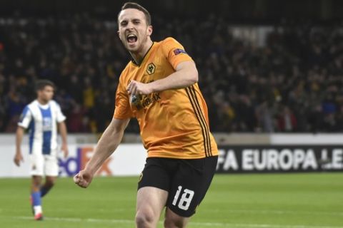 Wolverhampton Wanderers' Diogo Jota celebrates after scoring his side's opening goal during the Europa League round of 32 match between Wolverhampton Wanderers and Espanyol at the Molineux Stadium, in Wolverhampton, England, Thursday Feb. 20, 2020. (AP Photo/ Rui Vieira)