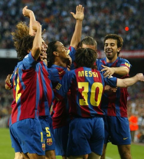 FC Barcelona celebrate after teammate Leo Messi scored against Albacete during their Spanish League soccer match in Barcelona, Spain, Sunday, May 1, 2005. Barcelona won 2-0. (AP Photo/Bernat Armangue)