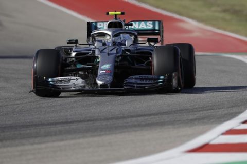 Mercedes driver Valtteri Bottas, of Finland, races during the qualifying session for the Formula One U.S. Grand Prix auto race at the Circuit of the Americas, Saturday, Nov. 2, 2019, in Austin, Texas. (AP Photo/Chuck Burton)