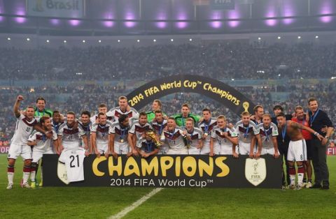 RIO DE JANEIRO, BRAZIL - JULY 13:  Germany celebrate after defeating Argentina 1-0 in extra time during the 2014 FIFA World Cup Brazil Final match between Germany and Argentina at Maracana on July 13, 2014 in Rio de Janeiro, Brazil.  (Photo by Jamie McDonald/Getty Images)