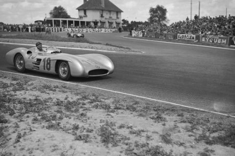 Juan Manuel Fangio of Argentina drives his Mercedes to victory in the French Grand Prix at Reims, July 4, 1954. (AP Photo/Jacques Marqueton)