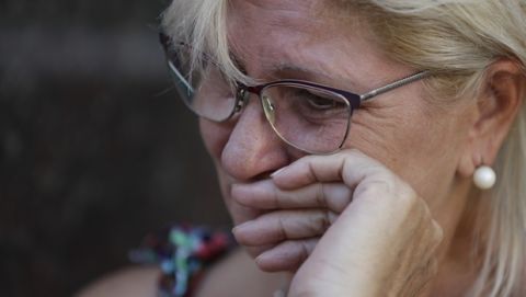 Mirta Taffarel, aunt of Emiliano Sala, cries while waiting for his remains, outside a funeral home in Santa Fe, Argentina, Friday, Feb. 15, 2019. The Argentina-born forward died in an airplane crash in the English Channel last month when flying from Nantes in France to start his new career with English Premier League club Cardiff. (AP Photo/Natacha Pisarenko)