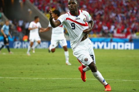 FORTALEZA, BRAZIL - JUNE 14:  Joel Campbell of Costa Rica celebrates scoring his team's first goal during the 2014 FIFA World Cup Brazil Group D match between Uruguay and Costa Rica at Castelao on June 14, 2014 in Fortaleza, Brazil.  (Photo by Robert Cianflone/Getty Images)
