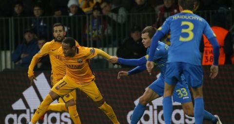 BATE Borisov's Belarusian defender Denis Polyakov (2ndR) vies for the ball with Barcelona's Brazilian forward Neymar (2ndL) during the UEFA Champions League group E football match between FC BATE Borisov and FC Barcelona at the Borisov Arena stadium outside Minsk on October 20, 2015. AFP PHOTO / MAXIM MALINOVSKY        (Photo credit should read MAXIM MALINOVSKY/AFP/Getty Images)