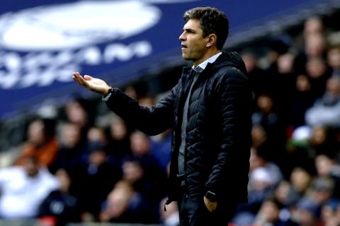 Southampton's manger Mauricio Pellegrino gestures to his players from the sidelines during their English Premier League soccer match between Tottenham Hotspur and Southampton at Wembley stadium in London, Tuesday, Dec. 26, 2017. (AP Photo/Alastair Grant)