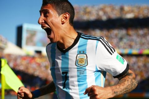 SAO PAULO, BRAZIL - JULY 01:  Angel di Maria of Argentina celebrates scoring his team's first goal in extra time during the 2014 FIFA World Cup Brazil Round of 16 match between Argentina and Switzerland at Arena de Sao Paulo on July 1, 2014 in Sao Paulo, Brazil.  (Photo by Julian Finney/Getty Images)