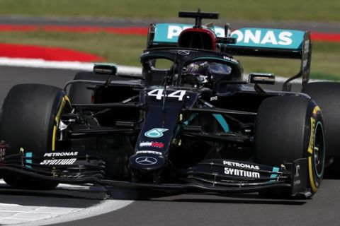 Mercedes driver Lewis Hamilton of Britain steers his car during the qualifying session for the British Formula One Grand Prix at the Silverstone racetrack, Silverstone, England, Saturday, Aug. 1, 2020. The British Formula One Grand Prix will be held on Sunday. (AP Photo/Frank Augstein, Pool)