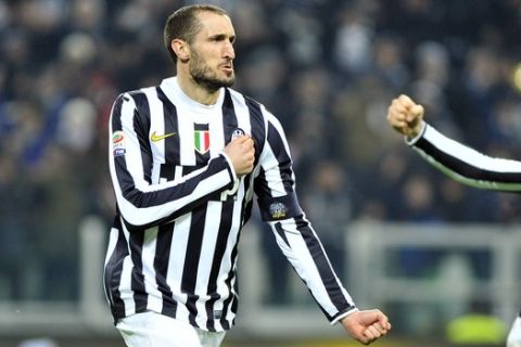 Juventus defender Giorgio Chiellini  celebrates after scoring during a Serie A soccer match between Juventus and Inter Milan at the Juventus stadium, in Turin, Italy, Sunday, Feb. 2, 2014. (AP Photo/Massimo Pinca)
