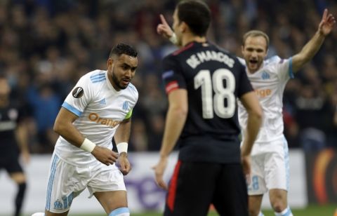 Marseille's Dimitri Payet reacts after scoring the second goal of his team during the Europa League round of 16, 1st leg soccer match between Marseille and Athletic Bilbao, at the Velodrome stadium, in Marseille, southern France, Thursday March 8, 2018. (AP Photo/Claude Paris)