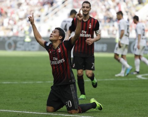 AC Milan's Carlos Bacca celebrates after scoring during a Serie A soccer match between AC Milan and Palermo, at the San Siro stadium in Milan, Italy, Sunday, April 9, 2017. (AP Photo/Luca Bruno)