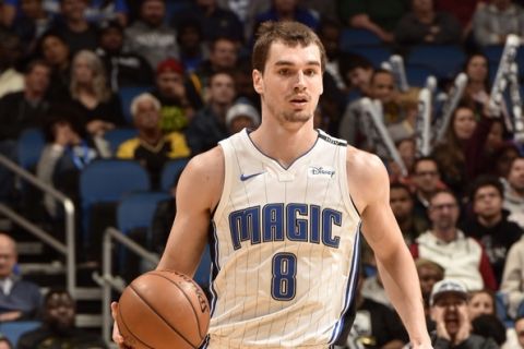 ORLANDO, FL - DECEMBER 13:  Mario Hezonja #8 of the Orlando Magic handles the ball against the LA Clippers on December 13, 2017 at the Amway Center in Orlando, Florida. NOTE TO USER: User expressly acknowledges and agrees that, by downloading and or using this Photograph, user is consenting to the terms and conditions of the Getty Images License Agreement. Mandatory Copyright Notice: Copyright 2017 NBAE (Photo by Gary Bassing/NBAE via Getty Images)