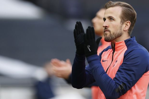 Tottenham's Harry Kane applauds to supporters during a warm up before the English Premier League soccer match between Tottenham Hotspur and Aston Villa at the Tottenham Hotspur Stadium in London, Wednesday, May 19, 2021. (Paul Childs/Pool via AP)