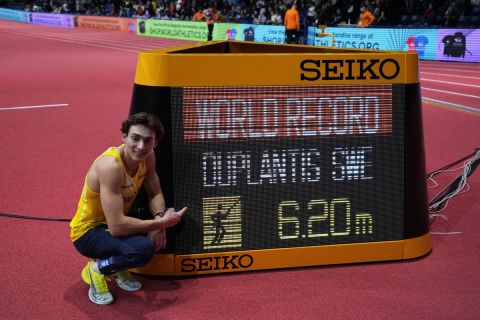Armand Duplantis, of Sweden, poses after setting a new world record at the end of the Men's pole vault at the World Athletics Indoor Championships in Belgrade, Serbia, Sunday, March 20, 2022. (AP Photo/Darko Vojinovic)