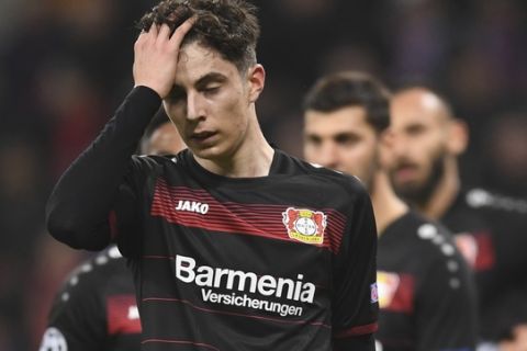 Leverkusen's Kai Havertz reacts during the first leg round of 16 match of the soccer Champions League  between Bayer Leverkusen and Atletico Madrid in the BayArena in Leverkusen, Germany, Tuesday, Feb. 21, 2017. (Marius Becker/dpa via AP)