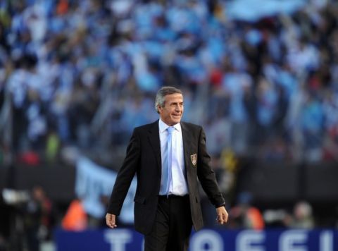 Uruguay's Head coach Oscar Tabarez celebrates at the end of the final of the 2011 Copa America football tournament againts Paraguay held at the Monumental stadium in Buenos Aires, on July 24, 2011. Uruguay won 3-0 and becomes champion of the 2011 Copa America.  AFP PHOTO / ALEJANDRO PAGNI (Photo credit should read ALEJANDRO PAGNI/AFP/Getty Images)