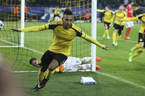 Dortmund's Pierre-Emerick Aubameyang celebrates after scoring the opening goal during the Champions League round of 16, second leg, soccer match between Borussia Dortmund and Benfica in Dortmund, Germany, Wednesday, March 8, 2017. (AP Photo/Michael Probst)