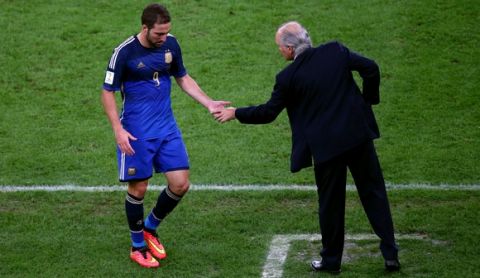 RIO DE JANEIRO, BRAZIL - JULY 13:  Gonzalo Higuain of Argentina shakes hands with head coach Alejandro Sabella as he exits the game during the 2014 FIFA World Cup Brazil Final match between Germany and Argentina at Maracana on July 13, 2014 in Rio de Janeiro, Brazil.  (Photo by Robert Cianflone/Getty Images)