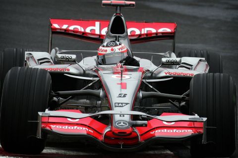Spain's Fernando Alonso steers his McLaren-Mercedes during a practicing session