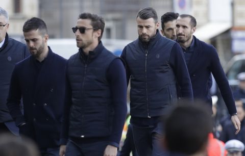 Juventus players arrive for the funeral ceremony of Italian player Davide Astori in Florence, Italy, Thursday, March 8, 2018. The 31-year-old Astori was found dead in his hotel room on Sunday after a suspected cardiac arrest before his team was set to play an Italian league match at Udinese. (AP Photo/Alessandra Tarantino)