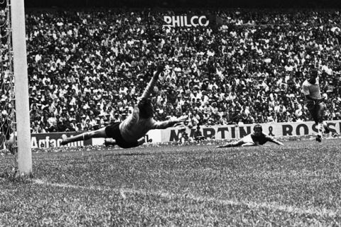 Carlos Alberto (right), scores BrazilÕs fourth goal against Italy, beating Italian goalkeeper Albertosi, during the world Cup final in Mexico City on June 21, 1970. In centre, ItalyÕs defender Rosato. Brazil won 4-1. (AP Photo)