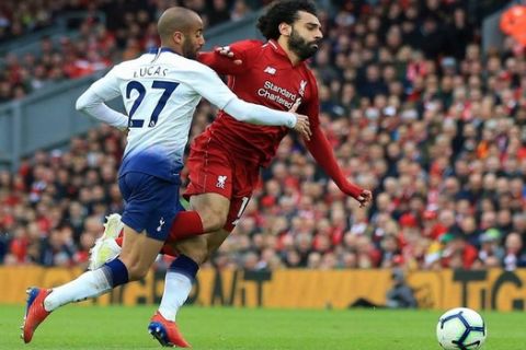31st March 2019, Anfield, Liverpool, England; EPL Premier League football, Liverpool versus Tottenham Hotspur; Lucas Moura of Tottenham Hotspur brings down Mohamed Salah of Liverpool on the edge of the penalty area PUBLICATIONxINxGERxSUIxAUTxHUNxSWExNORxDENxFINxONLY ActionPlus12119162 DavidxBlunsden  